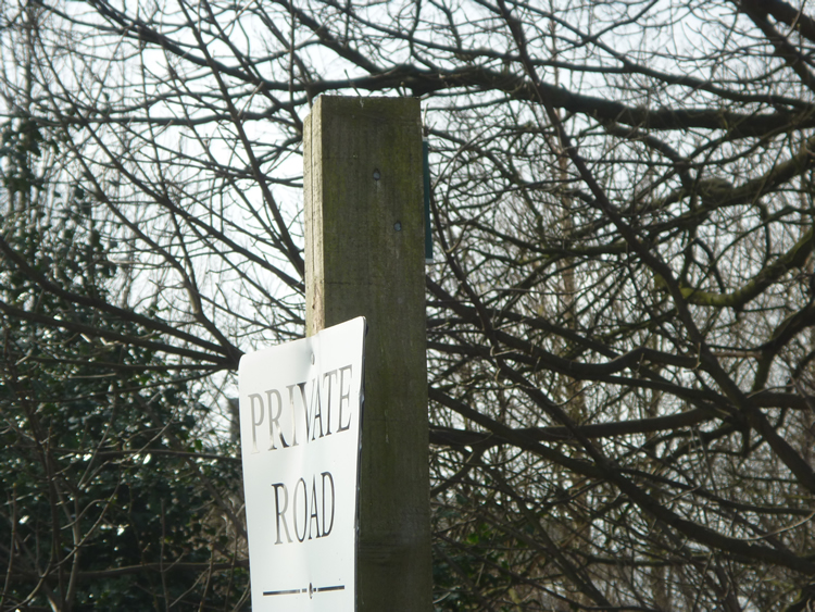 Photograph: 2010: Broken sign at Springwood Way